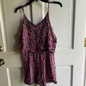navy and pink ruffled flower romper